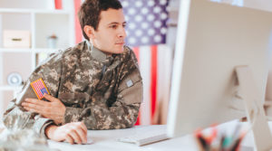 CSCI USMC Case Study large featured image of a soldier looking at a computer